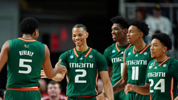 Miami (Fl) Hurricanes guard Isaiah Wong (2) high fives guard Harlond Beverly